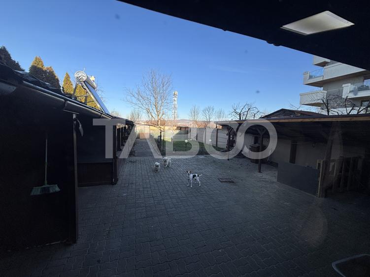 Casa individuala de vanzare cu 5 camere +spatiu comercial 3 bai Sibiu