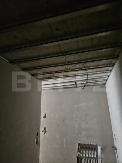 Apartament 3 camere, 2 bai, decomandat, etaj intermediar, zona Tractorul