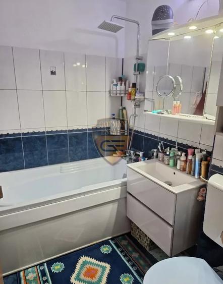 2 camere Centru Bd. Ferdinand 500m de mare parcare parter 59mp centrala gaz A/C