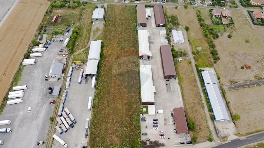 Proprietate industrială 5 hale, teren 21,105 mp, Santion,