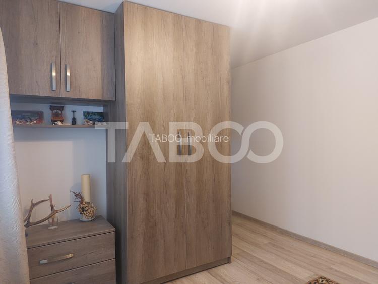 Casa in zona centrala 5 camere 2 bucatarii 3 bai curte comuna Cisnadie