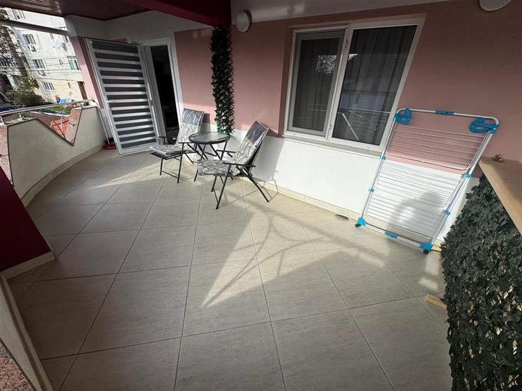 Garsoniera 45 mp (FACTURI INCLUSE), curte+ foisor, parcare