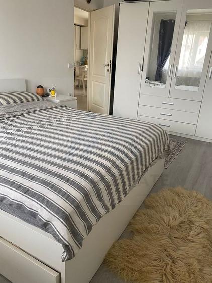 Apartament cu 3 camere 2 bai si curte individuala 74 mp în Șelimbăr