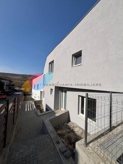 Casă cuplată modernă, 160 mp utili, semifinisată, curte amenajată