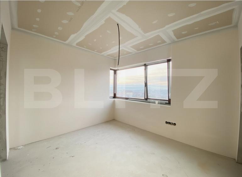 Casa moderna si luminoasa, cu spatii vitrate generoase, 610mp teren, 120 mp util