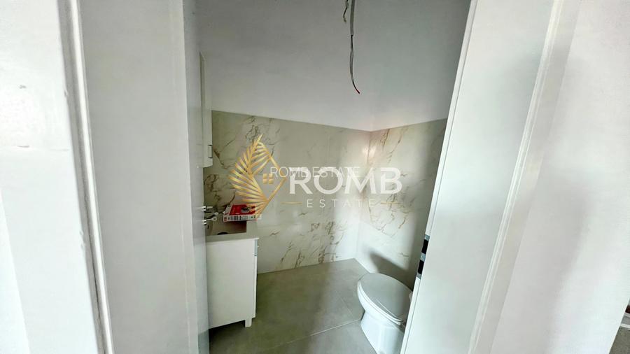 Apartament 3 camere, 70 mp utili, balcon, parcare, finisat, zona Pod IRA