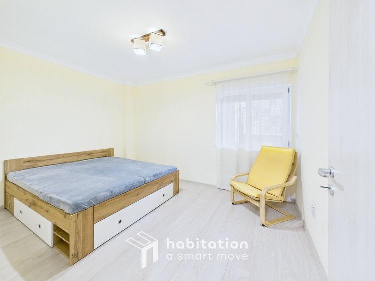 Apartament spațios cu curte și garaj – confortul unei case moderne