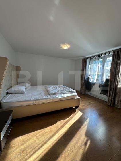 Două apartamente la casă, teren 250 mp, grădină, garaj, parcare proprie