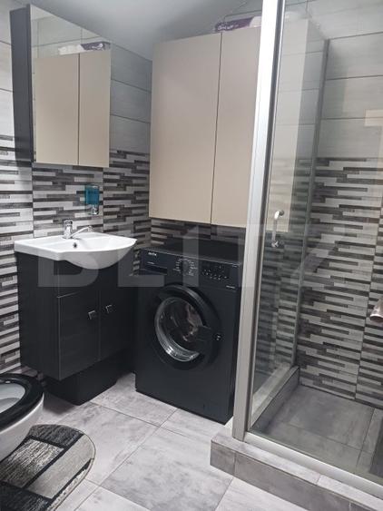 O locuință versatilă, cu două apartamente independente, Zona Fabric