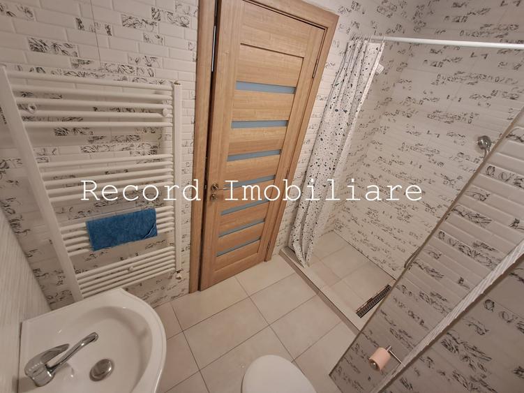Apartament 3 camere,2 bai,et.1,balcon,parcare subterana! zona Marasti
