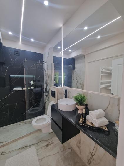 Apartament cu 2 camere,ultrafinisat ,zona centrală