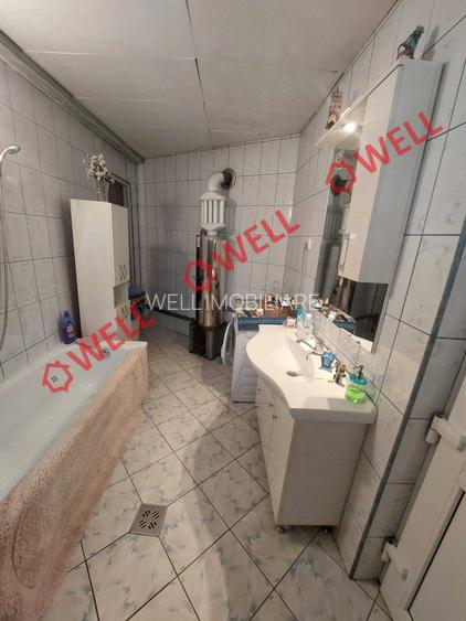 Casă familială de vânzare în Brețcu, la drumul principal! - 8