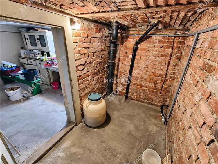 De vanzare casa cu 3 camere pivnita garaj si 508 mp teren in Sibiu - 28