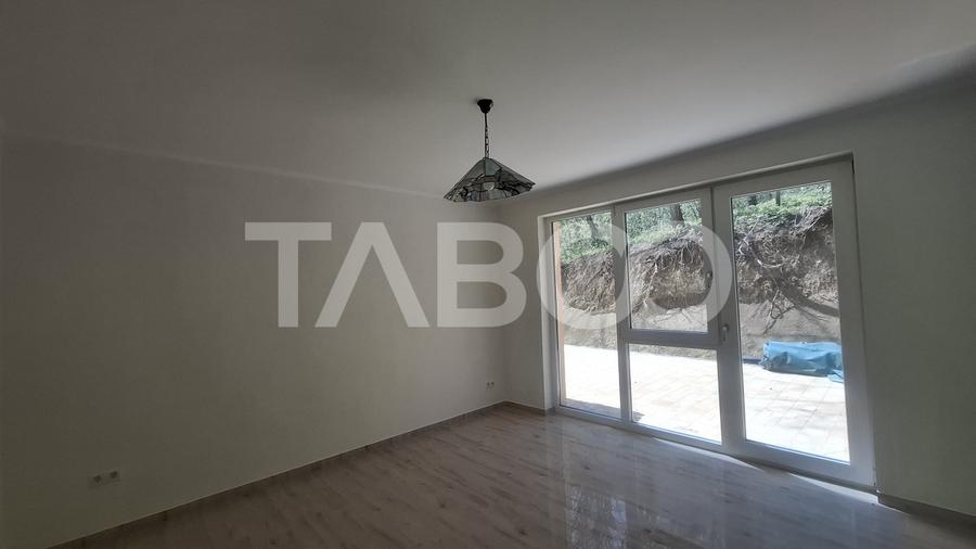 Casa de vanzare 405 mp utili 2 garaje 250 mp terase Slimnic Sibiu
