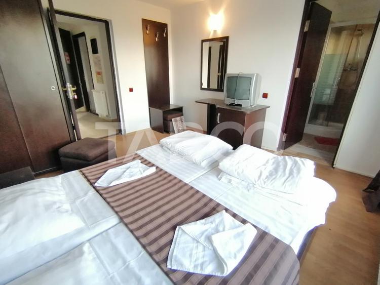 Pensiune 13 camere 16 bai sauna piscina si teren 1565 mp Cisnadioara