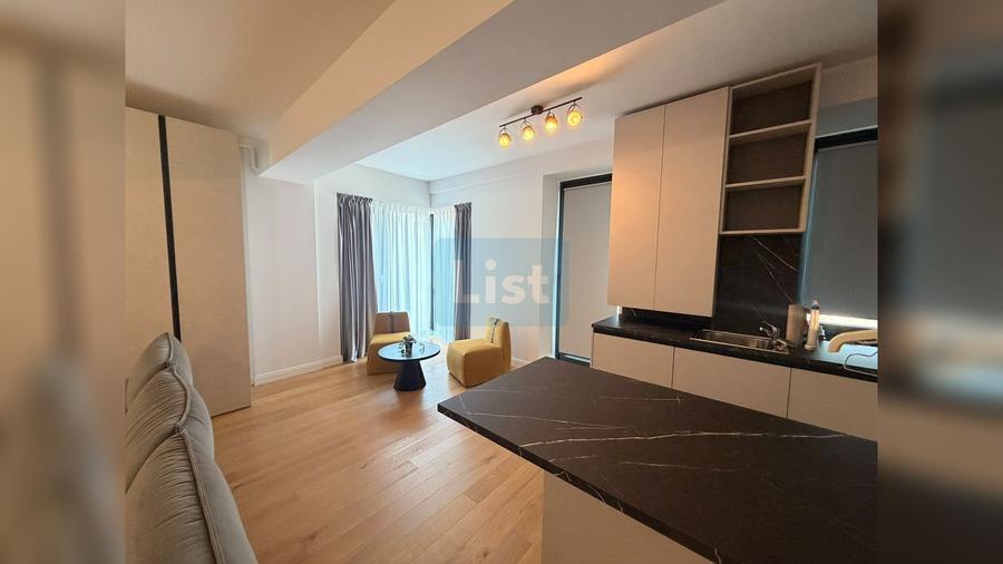 Apartament modern cu 2 camere, finisaje premium și loc de parcare