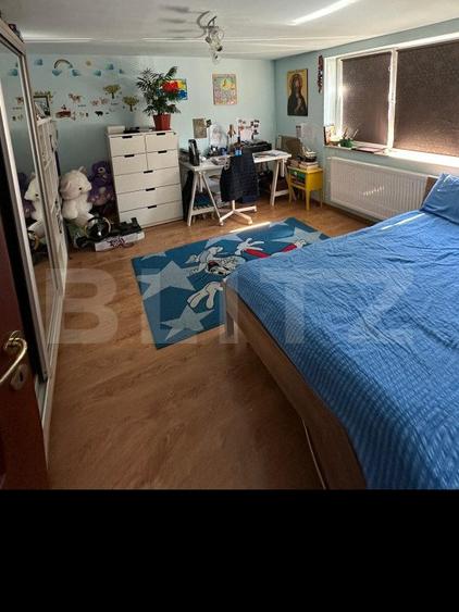 Două apartamente la casă, teren 250 mp, grădină, garaj, parcare proprie