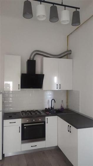 2 cam - zona Podgoria - la curte comuna