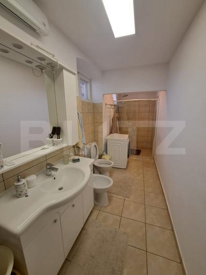 Casă săsească renovată integral, 2200 mp teren, ideală pentru două familii