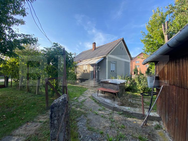 Casă cu teren 10 ari, 2 anexe și dublu front stradal – Beclean