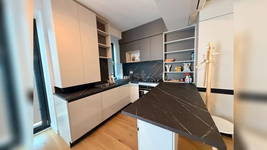 Apartament modern cu 2 camere, finisaje premium și loc de parcare