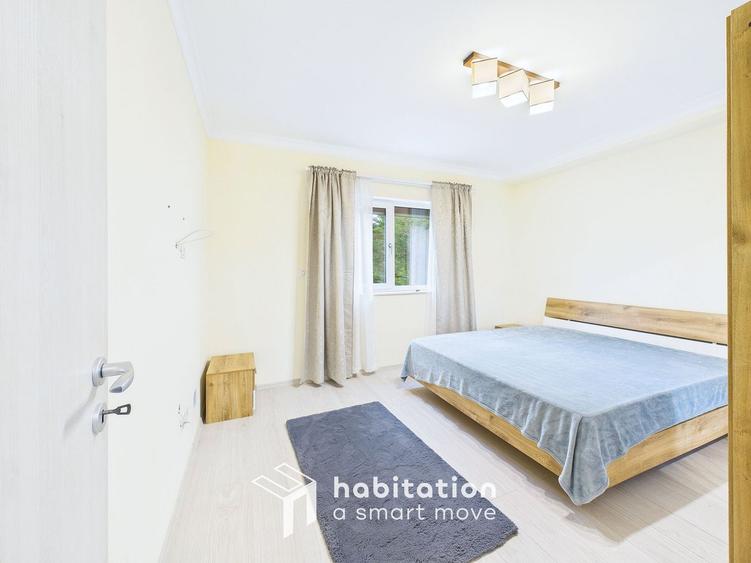 Apartament spațios cu curte și garaj – confortul unei case moderne