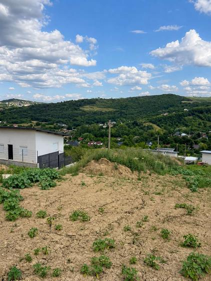 Teren Intravilan Tomești Iasi, 430 mp cu Utilități - Curent, Apă, Canalizare, Vedere Panoramica și Zonă Nouă de Case
