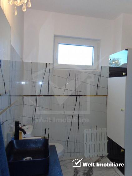 Casa individuala finisata P+E, 4 dormitoare,3 parcari intrare Chinteni