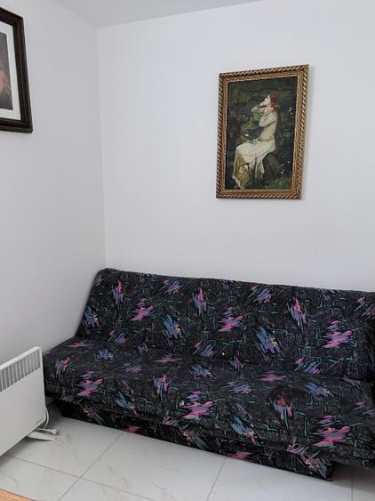 Apartament la curte cu loc de parcare