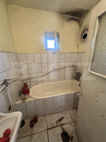 Casa plan parter 74 mp utili , 1500 mp teren,zona Lucian Blaga
