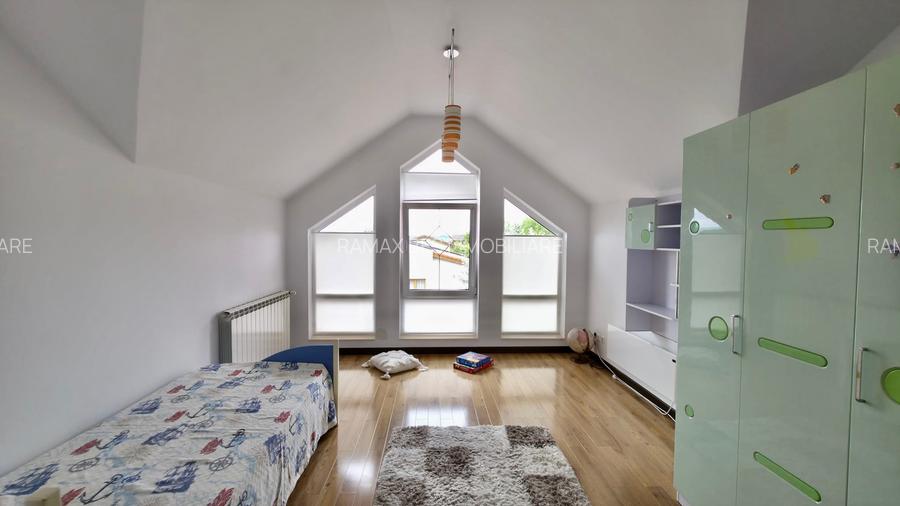 Casă individuală cu 4 dormitoare, grădină 850 mp și garaj dublu - 12
