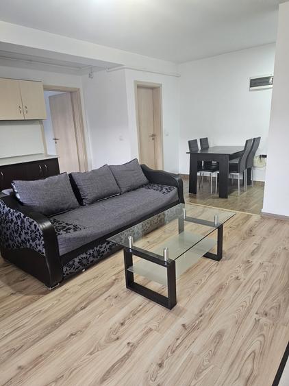 Apartament 2 camere mobilat,parcare,Tractorul-Coresi,124900 Euro