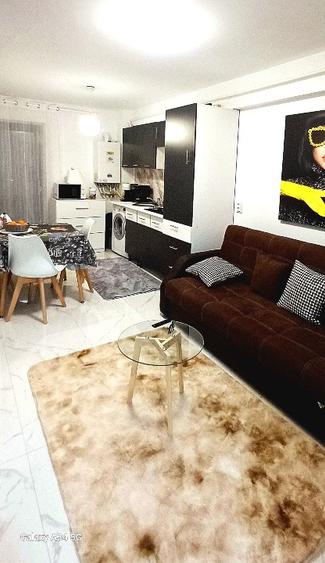Închiriez apartament 2 camere open space