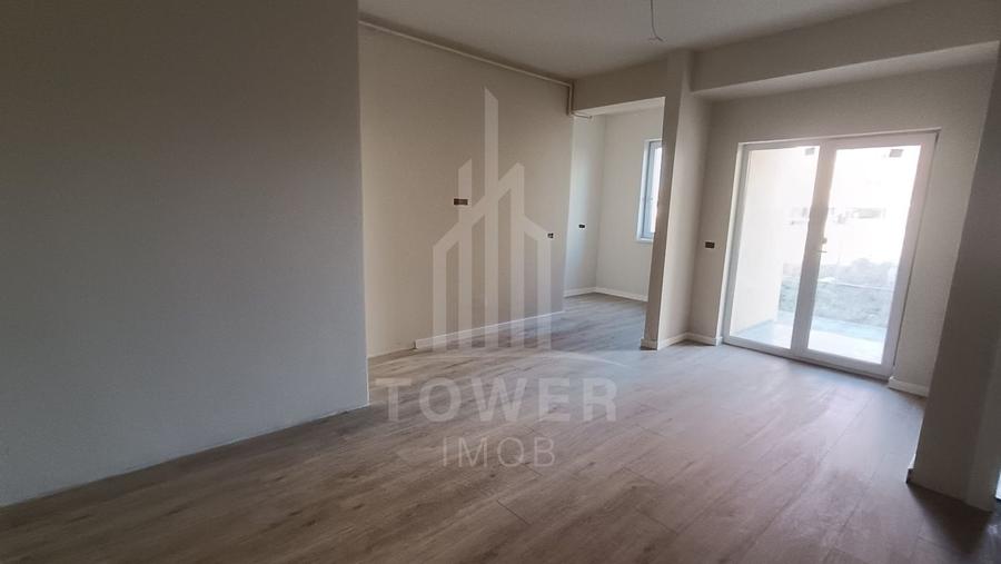 Apartament cu trei camere si gradina proprie