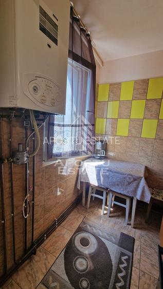 Apartament de vanzare cu 3 camere, centrala proprie, zona Dacia - 10