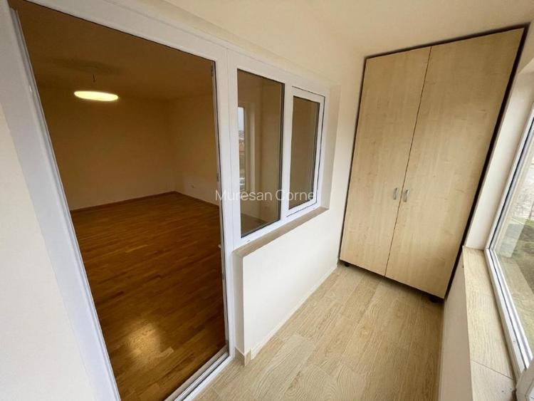 Inchiriez ap. 2 camere, minim 2 ani, renovat, garaj, et.2, lift, balcon 12 mp. - 13