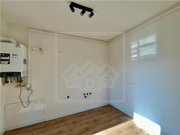 Ap.2 camere, etaj 1/2, intabulat, finisat la cheie - terasa 14 mp