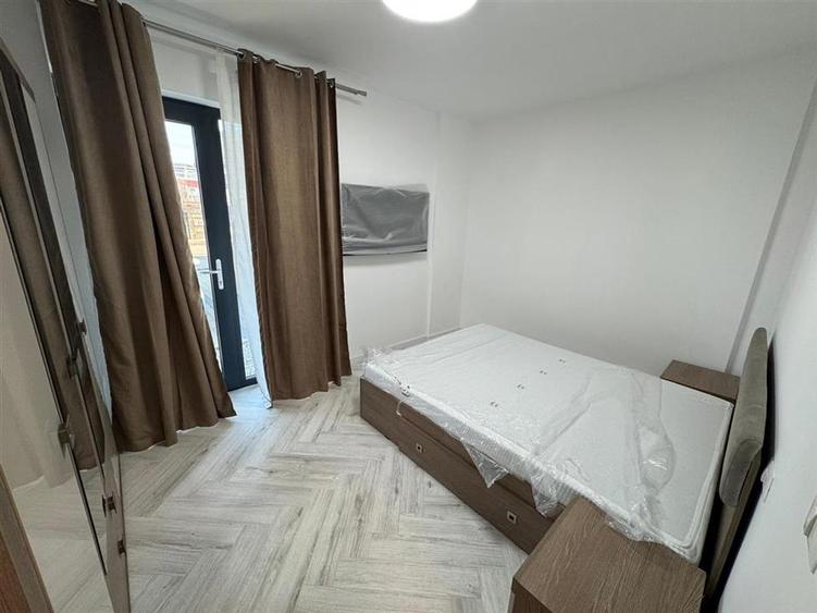 Ap 2 cam,parter,parcare, bloc nou, Scoala 2 - Piata Moldovei