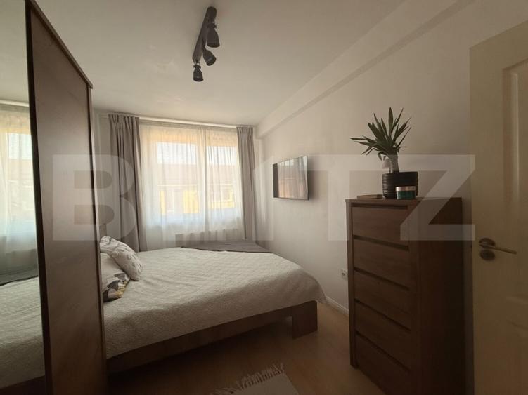 Apartament cu 3 camere de vânzare, Garaj subteran, zona Centrala