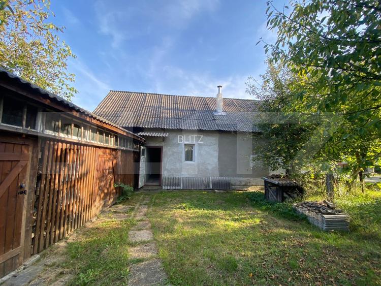 Casă cu teren 10 ari, 2 anexe și dublu front stradal – Beclean
