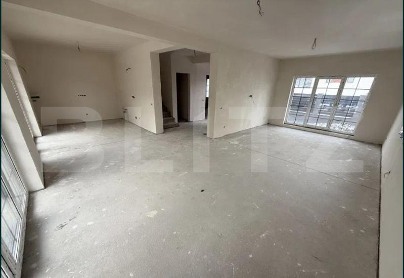 Casă individuală în Chinteni, 120 mp utili, teren de 500 mp, garaj