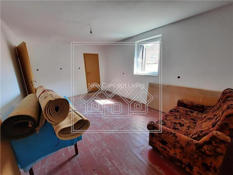 Casa in centrul Cisnadioarei - teren 1177 mp - ideal investitie - 15