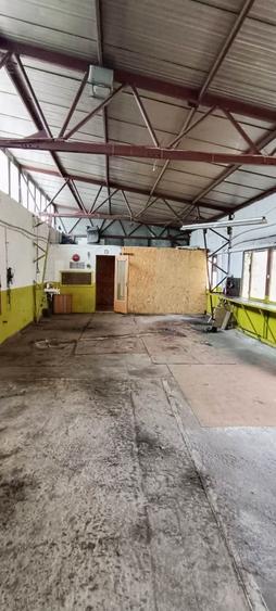 Proprietate cu 2 hale si casa la inchiriat,teren 1350mp