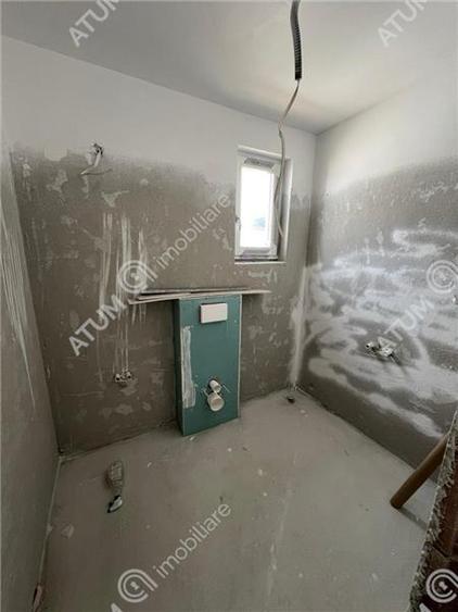 Casa cu 4 camere 2 bai curte de 50 mp zona Calea Cisnadiei Sibiu