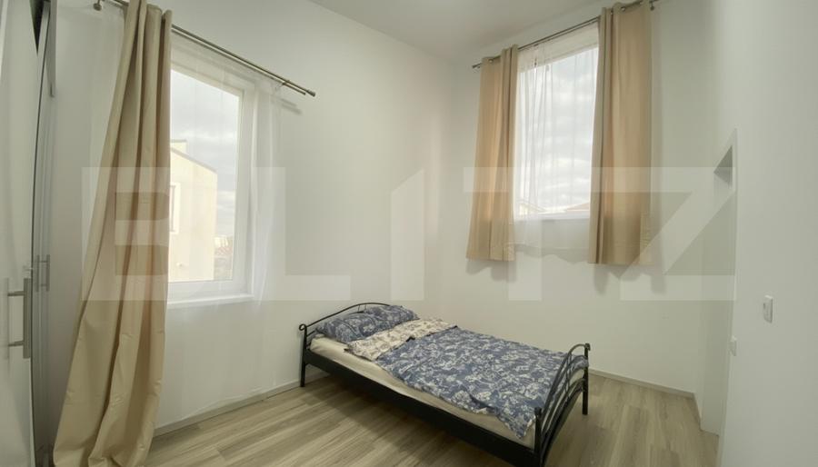 Casa pe calcan cu priveliste superba si compartimentare deosebita.