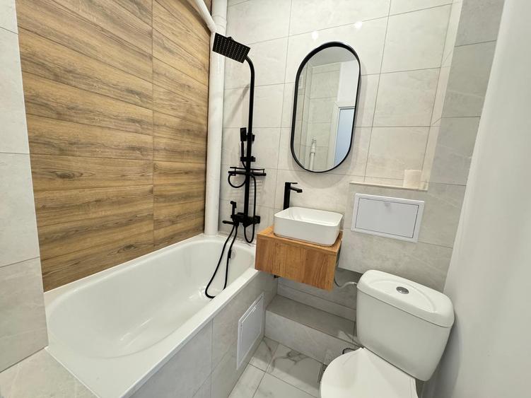 Apartament cu 2 camere, parter, zona Podu Ros