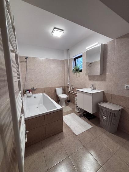 Casa la curte tip duplex
