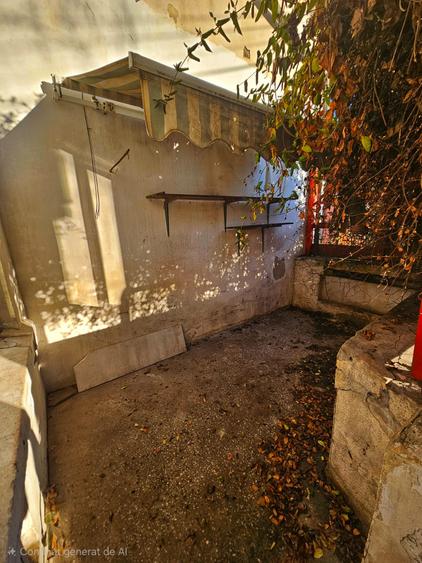 Casă cu arhitectură interbelică, 5 camere, teren 409 mp – Central