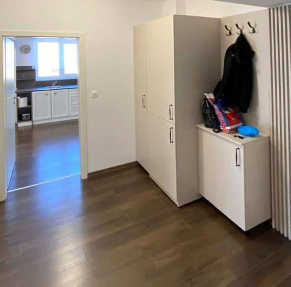 Apartament modern cu 2 camere pereți retractabili terasă parcare și boxă