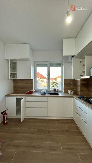 Duplex cu 4 camere si teren de 375 mp - zona Sanandrei